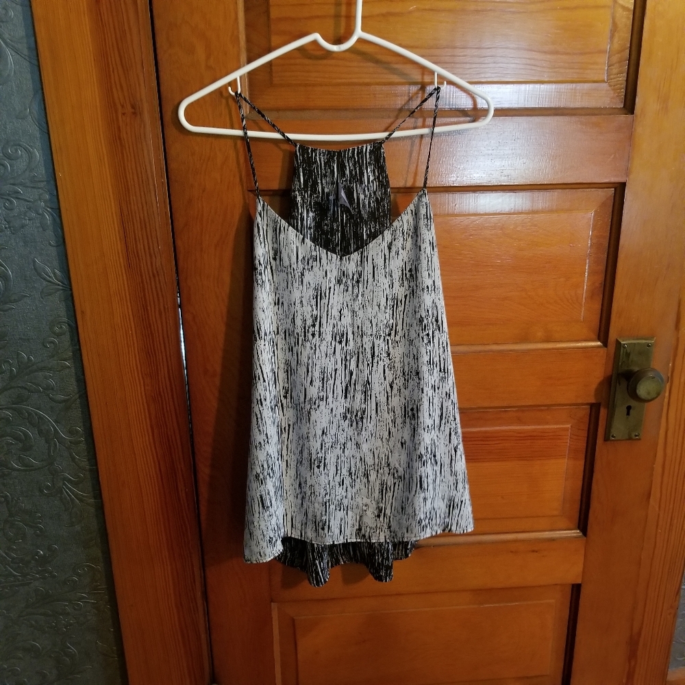Express.  Loose-fitting spaghetti strap blouse.  L